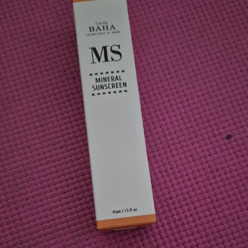 Orange and White Sunscreen Tube